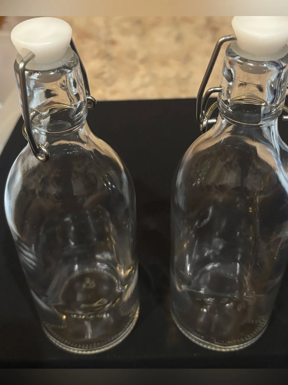 IKEA KORKEN clear glass swing-top bottles. set of 2